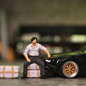 Aktuell MU-H0-W92167 H0 Figurenset Milieu Boss sitzt auf Geldpaketen